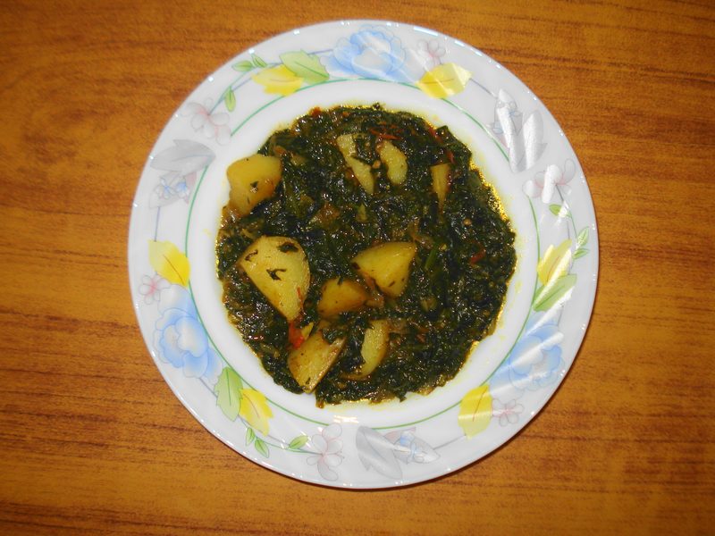 Aloo palak, potatoes cooked with spinach
